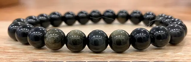 Bracelet boule Obsidienne dorée 8mm